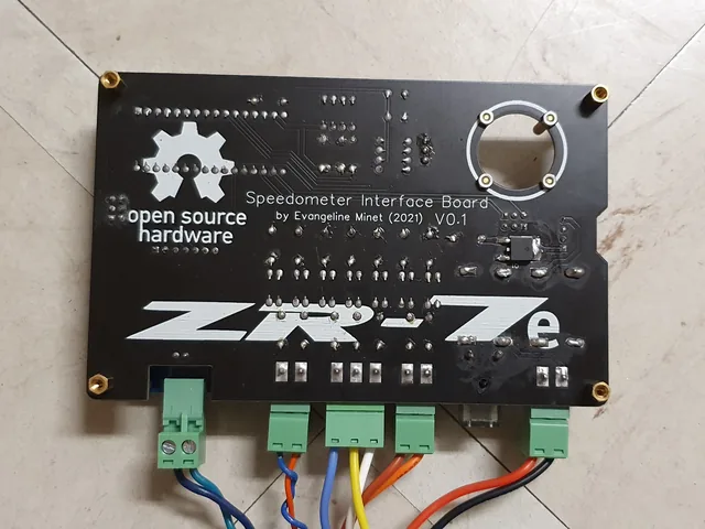 The back of the board, silkscreened &ldquo;Speedometer Interface Board by Evangeline Minet (2021) V0.1&rdquo; with an open-source hardware logo.
